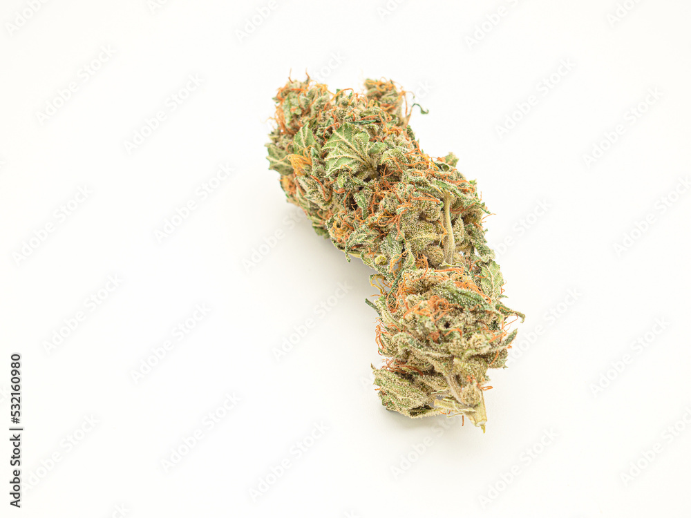 Dry cannabis buds flowers on a white background Dry cannabis buds flowers on a white background