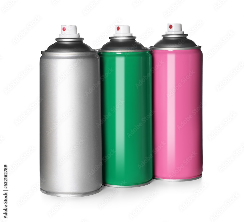 Colorful cans of spray paints on white background Colorful cans of spray paints on white background