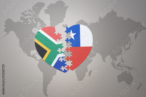 puzzle heart with the national flag of south africa and chile on a world map background. 3D illustration