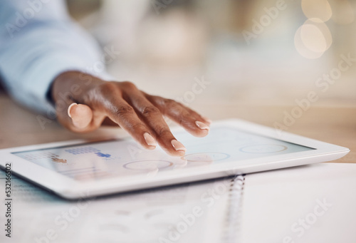 Hands, tablet and finance with the hand of a business woman working online in her office at work. Accounting, banking and management with a female employee planning a strategy for future growth