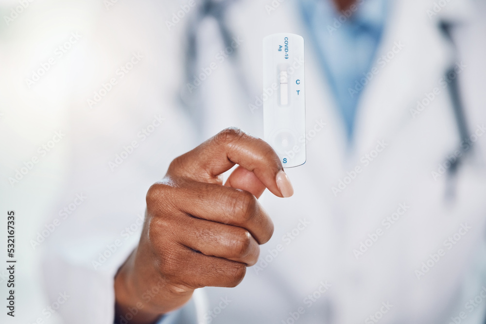 Doctor hands, covid and negative rapid antigen test results in hospital for healthcare, medical risk and safety. Closeup corona virus surgeon, medicine worker and clinic expert holding pcr cassette Doctor hands, covid and negative rapid antigen test results in hospital for healthcare, medical risk and safety. Closeup corona virus surgeon, medicine worker and clinic expert holding pcr cassette