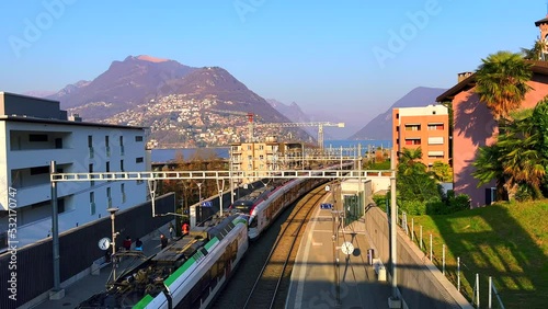 Mountains behind Lugano-Paradiso Railway Station, Lugano, Switzerland photo