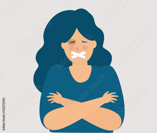  Scared woman with closed mouth suffers from physical abuse. Female is punched in the face by aggressor or abuser. Stop domestic violence against women and men concept. 
 photo