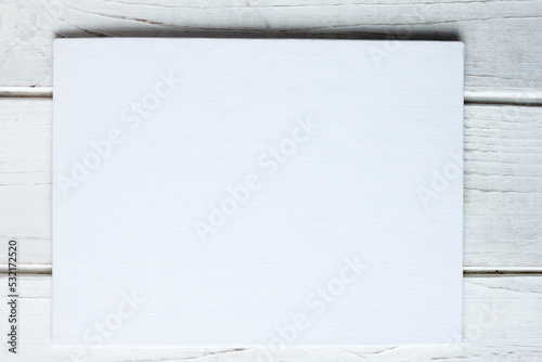 White canvas list over a wh...