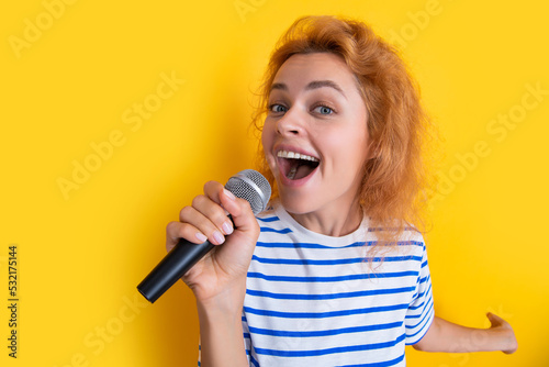 Canvas-taulu happy karaoke woman singer isolated on yellow background