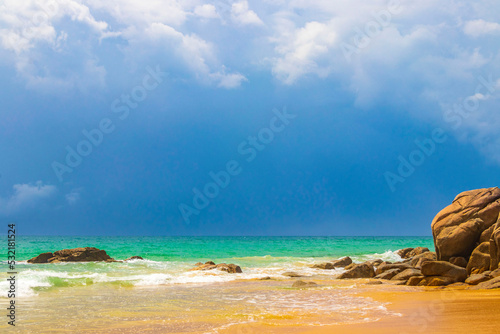 Naithon Beach bay turquoise clear water and waves Phuket Thailand. photo