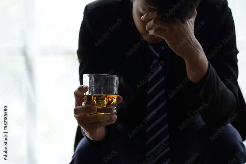 Businessman handshake after make deal, alcoholism, alcohol addiction and people concept - male alcoholic with glass of whiskey lying or sleeping on table Businessman handshake after make deal, alcoholism, alcohol addiction and people concept - male alcoholic with glass of whiskey lying or sleeping on table