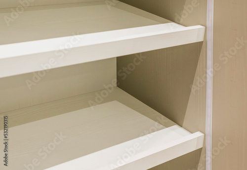 White shelves of the new cabinet