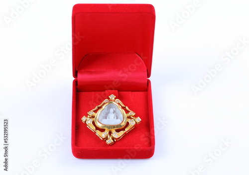 Buddha Pendant Jewel over in  gift boxes for jewelry isolated on white background