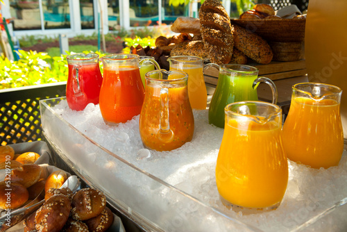 Juice in glass jars. Colorful smoothies and Juices in glass jars.