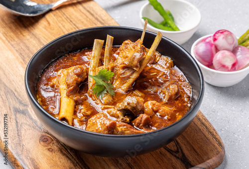 Mutton curry or Mutton gravy is a delicious Indian curried dish of soft tender chunks of meat in spicy onion tomato gravy