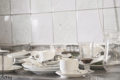 Wallpaper Mural Dirty dishware on metal table Torontodigital.ca