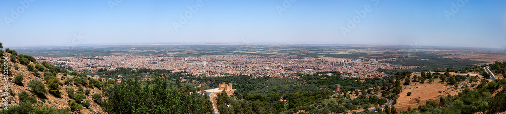 Great panoramic view of the Moroccan city of Beni Mellal-Jenifra with its castle which is located between the Middle Atlas and the plain of Tadla, in the center of Morocco. Concept landscape, city.