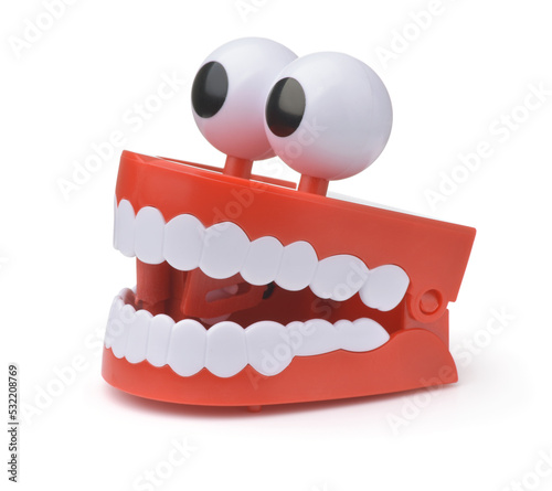 Slika na platnu Funny toy clockwork jumping teeth with eyes
