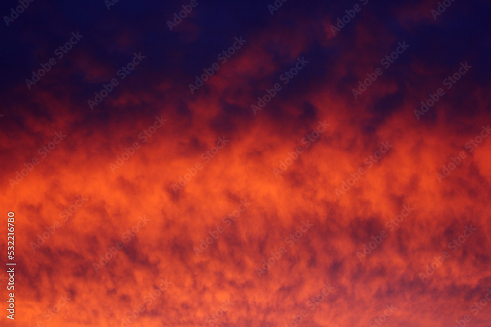 abstract background with fiery clouds at sunset