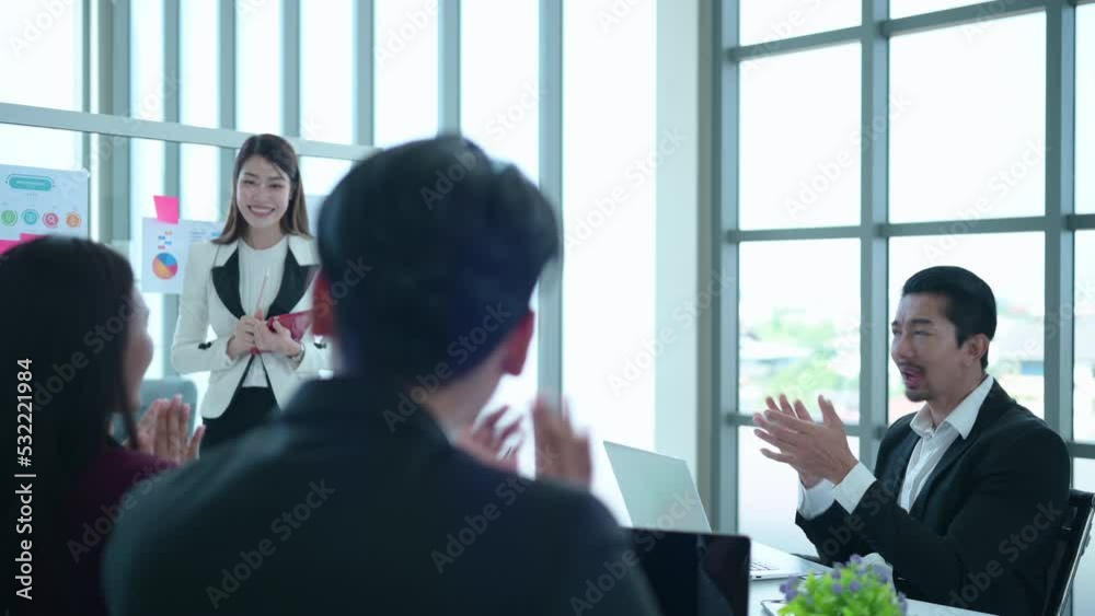 Young asian woman freshmen in the new generation of entrepreneurs team. Successfully presented the project to the satisfaction of the management