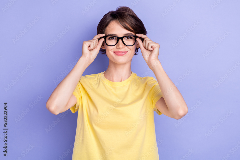 Photo of pretty positive clever lady hands touch glasses isolated on violet color background Photo of pretty positive clever lady hands touch glasses isolated on violet color background