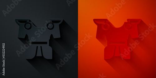 Paper cut Body armor icon isolated on black and red background. Paper art style. Vector