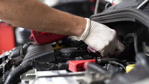 auto mechanic repairs car engine. car service. close-up.