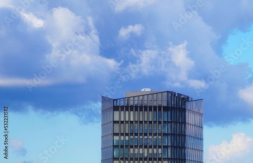 building with clouds