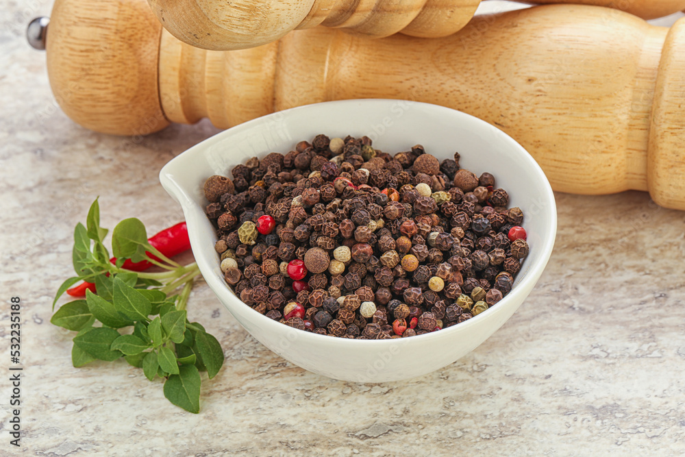 Peppercorn mix heap in the bowl Peppercorn mix heap in the bowl