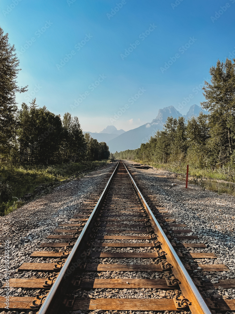 Train tracks through the Rocky Mountains in Canmore, Canada.
