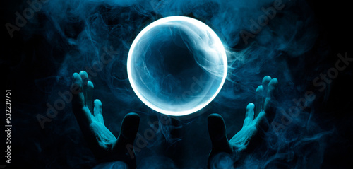Fototapete Crystal sphere in hands
