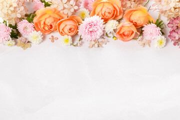 Autumn creative composition roses, hydrangea flowers on gray background. Fall, autumn background. Flat lay, top view, copy space