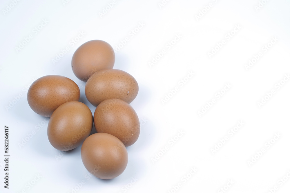 Small group of Chicken eggs on white background. Top view Small group of Chicken eggs on white background. Top view
