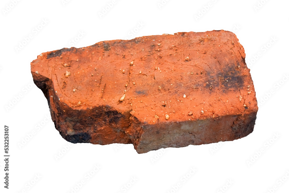 Chunk of red brick isolate on a white background close-up. Old red brick isolated on white background.