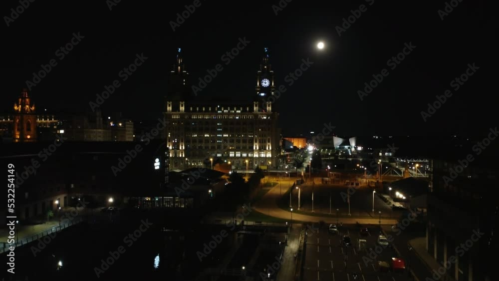 Aerial drone view of Liverpool city and port at night, United Kingdom Aerial drone view of Liverpool city and port at night, United Kingdom