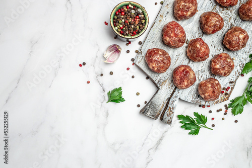 Raw meatballs minced pork on a light background, banner, menu, recipe place for text, top view