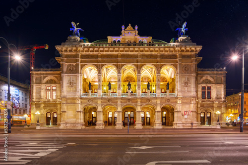 vienna, austria - oct 17, 2019: facade of famous opera house at night. popular travel destination photo