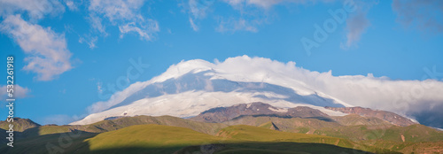 Elbrus mountain and rising sun.