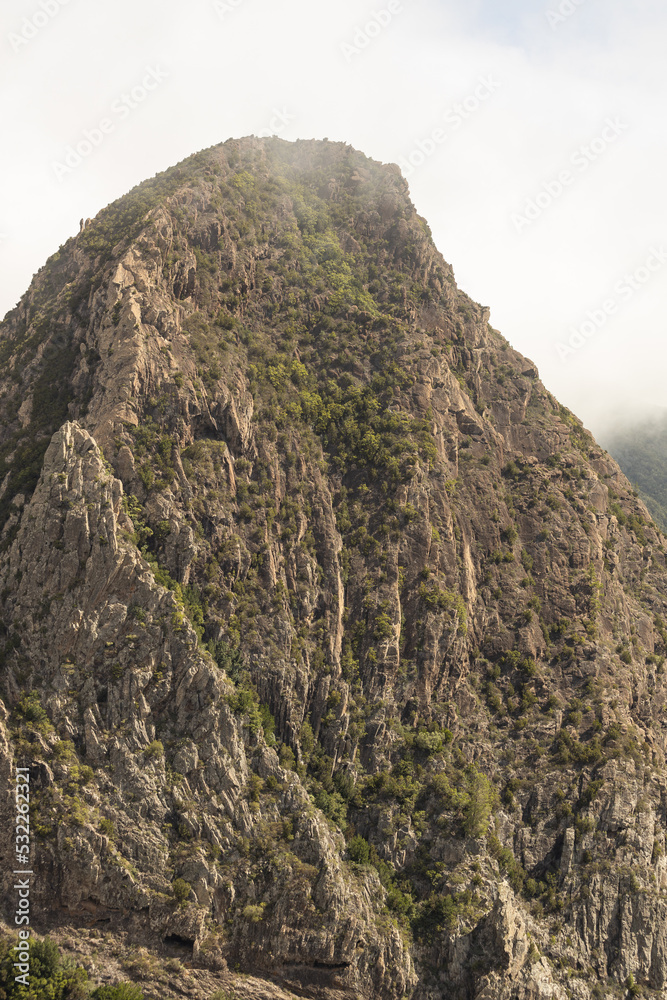 Scenic view of cliff in Garajonay National Park, La Gomera.