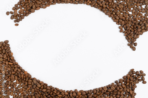 Fototapeta Naklejka Na Ścianę i Meble -  Circle frame of coffee beans isolated on white background, example for advertising.