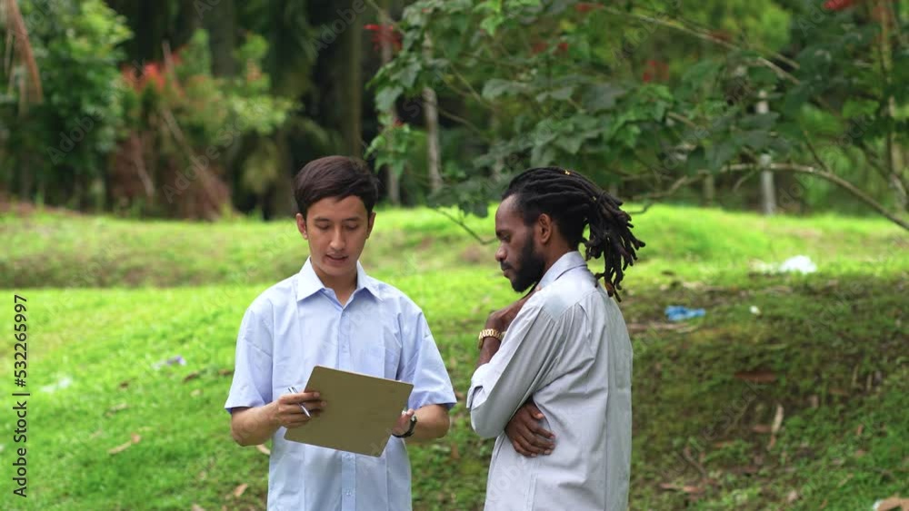 Two Young Man Discussed Over Something in the Nature Two Young Man Discussed Over Something in the Nature