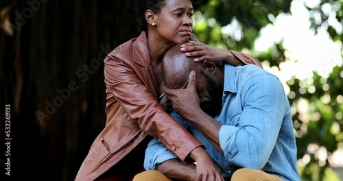 Couple empathy, african woman consoling suffering depressed man
