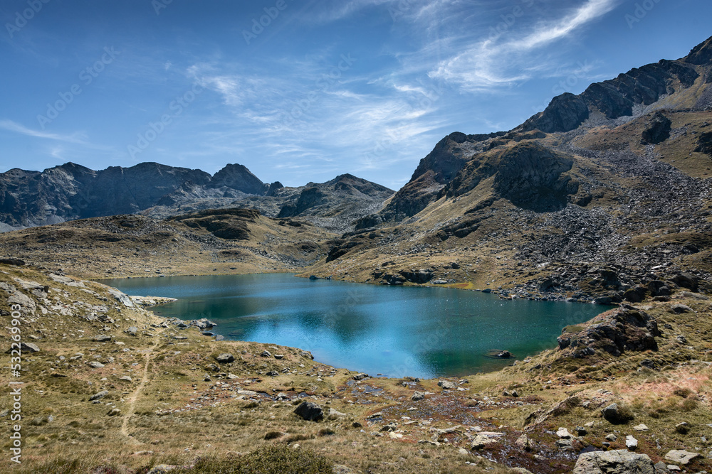 Superb panorama in the French Pyrenees with a beautiful lake in the foreground - France - Europe Superb panorama in the French Pyrenees with a beautiful lake in the foreground - France - Europe