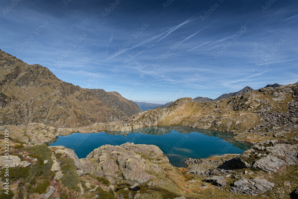 Superb panorama in the French Pyrenees with a beautiful lake in the foreground - France - Europe