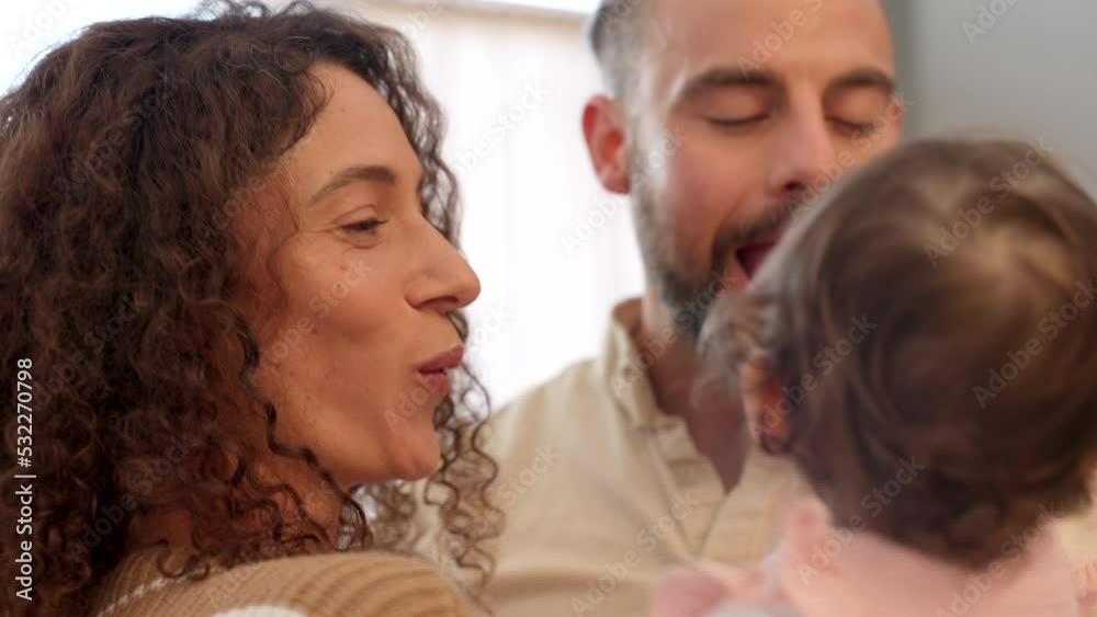 Family care, baby love and communication talking to a newborn, happy girl in conversation with parents and smile together in home. Mother and father speaking to playful, positive and sweet child Family care, baby love and communication talking to a newborn, happy girl in conversation with parents and smile together in home. Mother and father speaking to playful, positive and sweet child