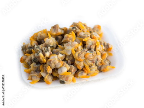 A takeaway plate of Cockles from a seafood stall isolated on a white background