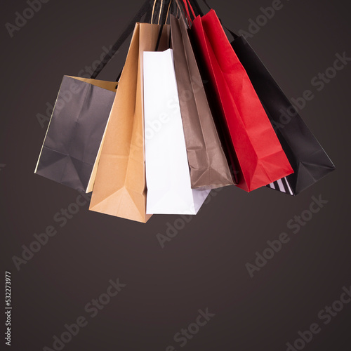 Colorful shopping bags in dark background