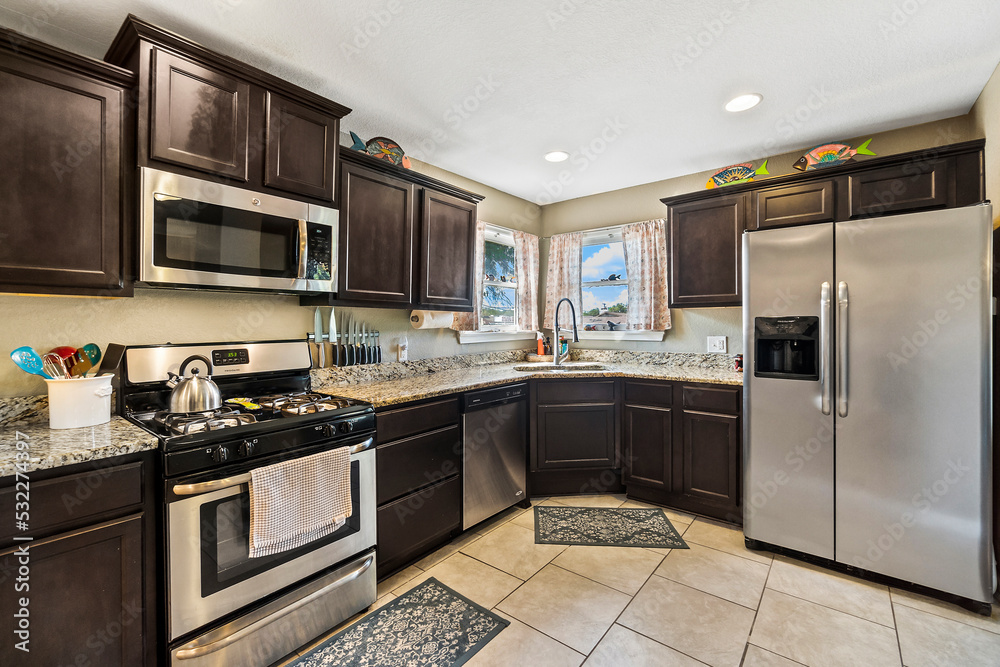 white kitchen with neutral accents white kitchen with neutral accents