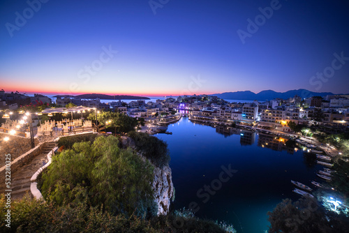 Summer sunrise over a sleeping Cretan town.