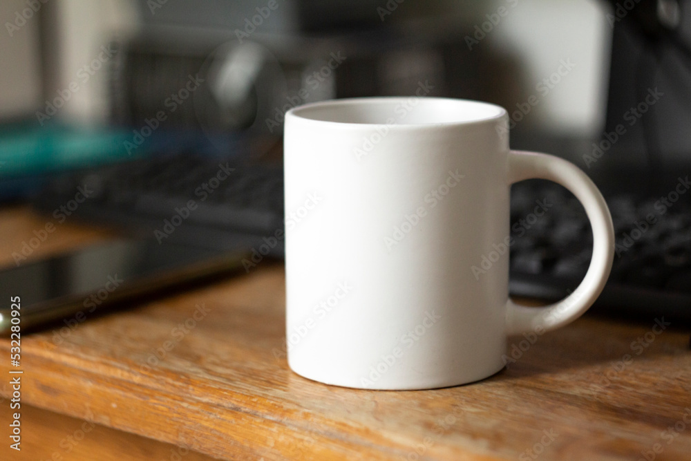 White mug on the desktop