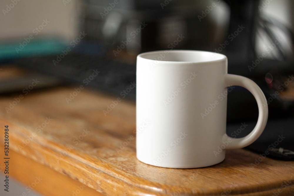 White mug on the desktop