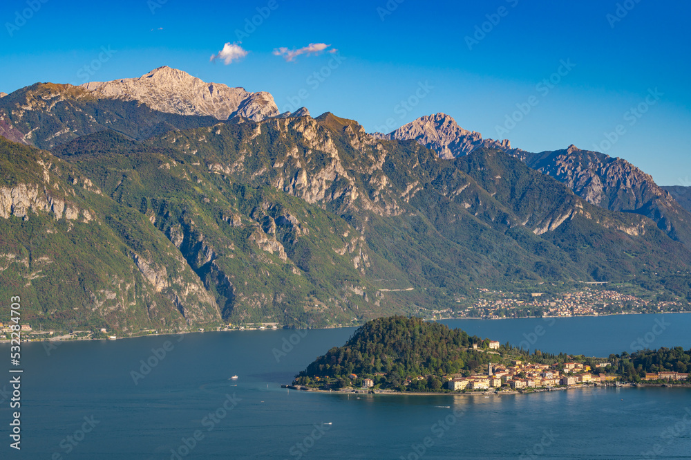The panorama of Lake Como, photographed from the church of San Martino in Griante, showing the Northern Grigna, the Southern Grigna, the Lecco branch, the town of Bellagio, and the surrounding mountai