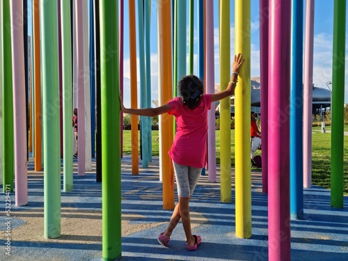 Italy, Milan, city life: child on playground, colors, art design  © doryx