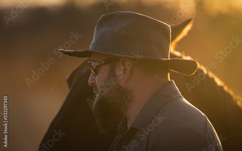 Fotografiet Cowboy and his Horse